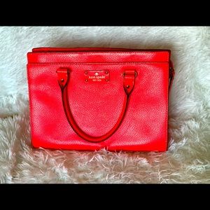 Kate Spade pinkish/reddish handbag.